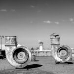 Black and white photo of old rooftop ventilators in Lviv, Ukraine, showing industrial architecture.