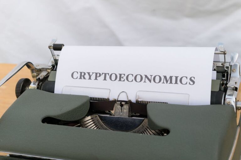 A vintage typewriter printing the term 'Cryptoeconomics', blending old technology with modern finance.